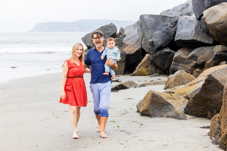 Coronado Beach family photographer capturing lasting memories of parents, baby, and dog together
