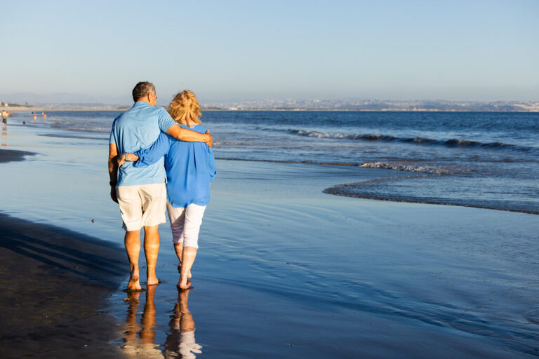 Extended family beach portraits by a lifestyle photographer in San Diego and Coronado