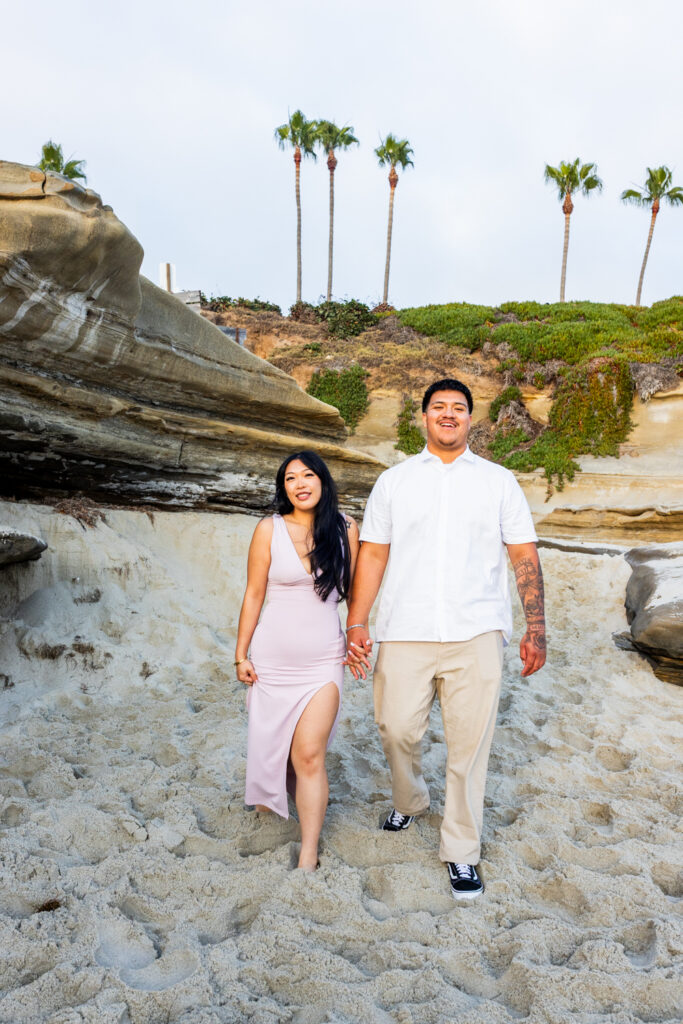 A Low-Key La Jolla Proposal with 50 Red Roses and Family Waiting Nearby san diego beach photographer 8