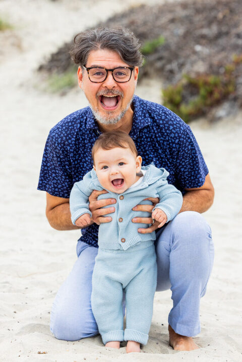Baby and parents photographed during a family beach photoshoot in Coronado, California